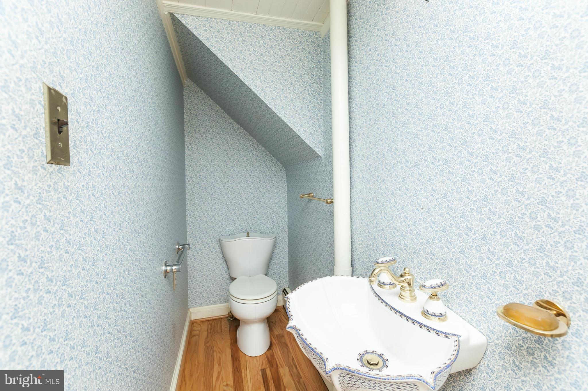 11315 Garrison Forest Road Owings Mills, MD 21117 - Photo 22 of 30 First floor powder room