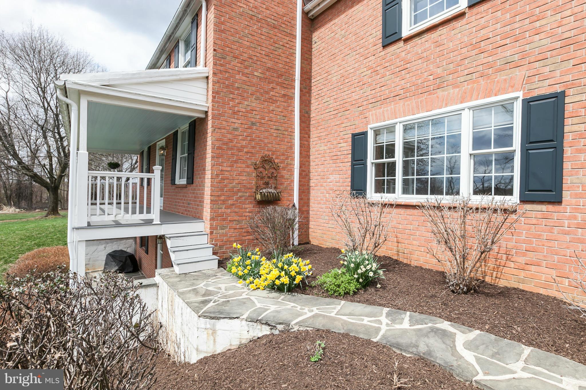 11315 Garrison Forest Road Owings Mills, MD 21117 - Photo 4 of 30 Flagstone walk to covered side porch