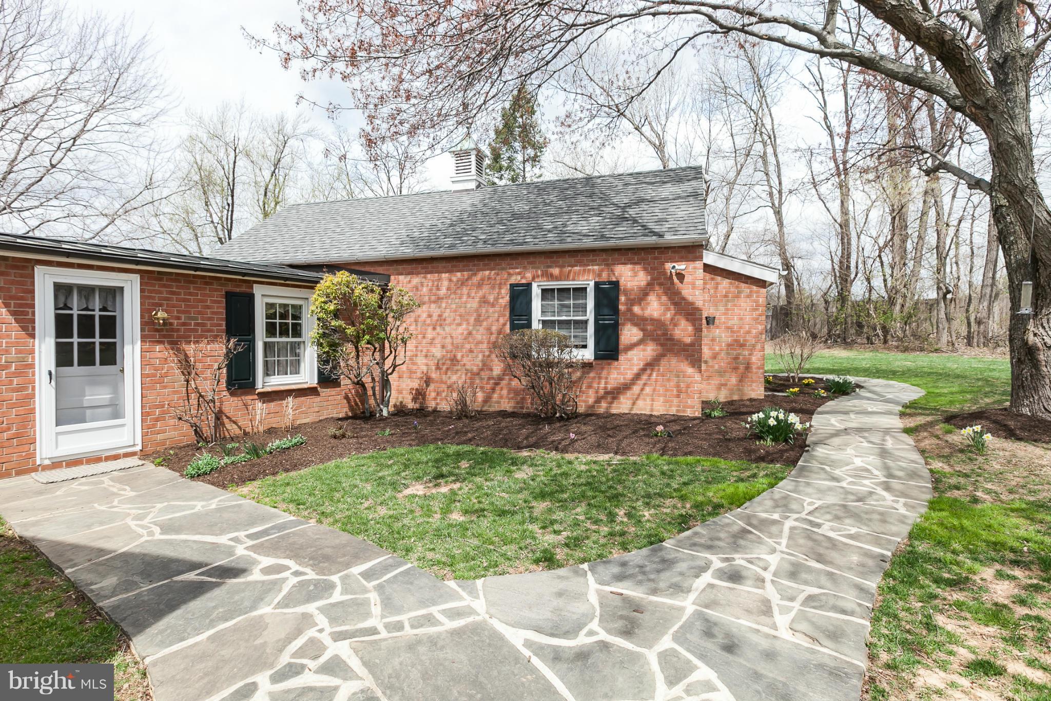 11315 Garrison Forest Road Owings Mills, MD 21117 - Photo 10 of 30 Flagstone walks to breakfast room, shed and garage