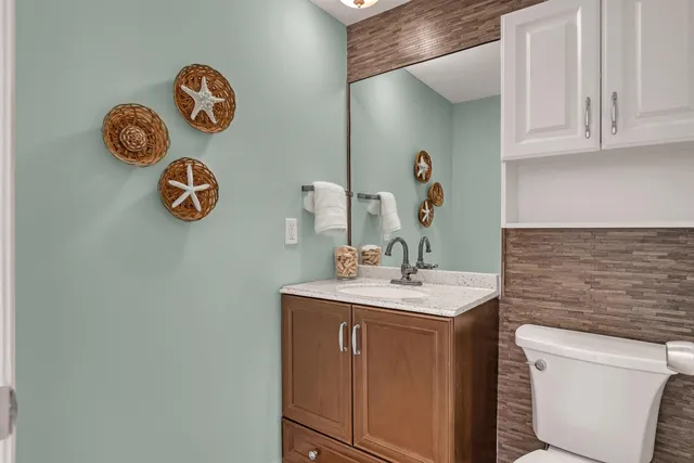 a view of a hallway with stairs