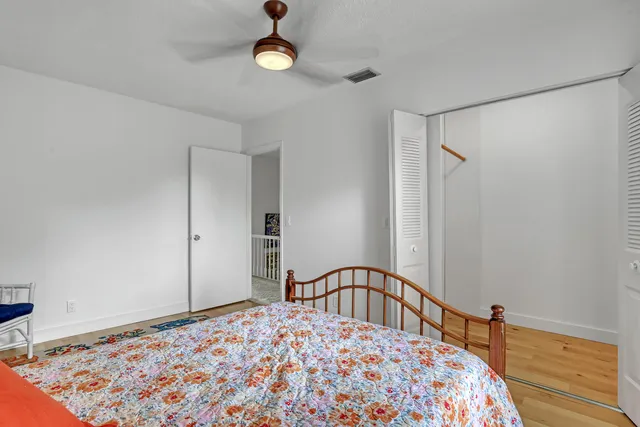 a kitchen with kitchen island a sink counter top space appliances and cabinets