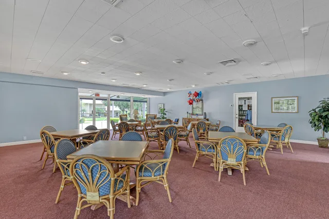 a garden with trees in front of it