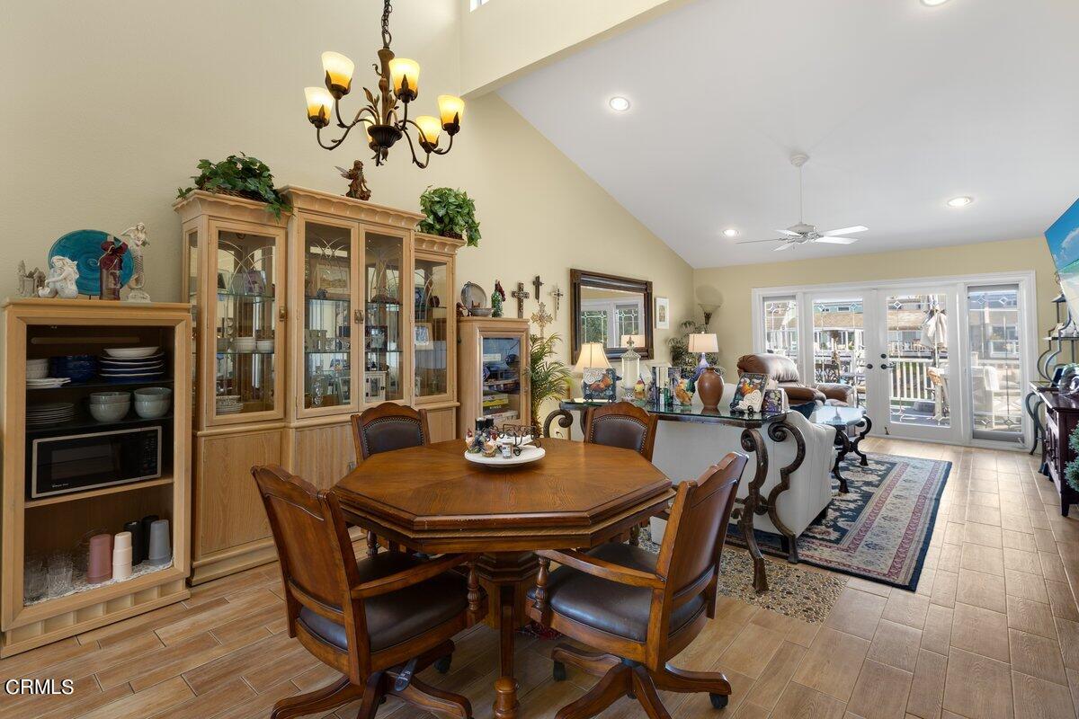 4620 Falkirk Bay Oxnard, CA 93035 - Photo 2 of 24 a view of a dining room with furniture and chandelier