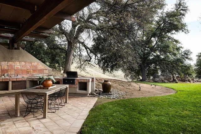 a bed room with a bed and a large window