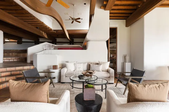 a view of a green field with lots of bushes