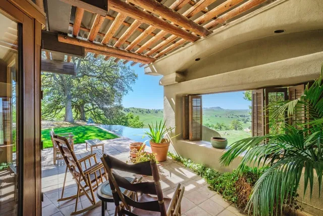 a view of an ocean and a yard