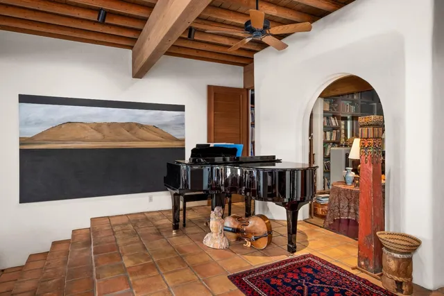 a view of a green field with lots of bushes