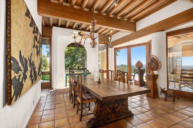 a house view with a wooden fence