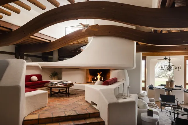 a view of a park with large trees