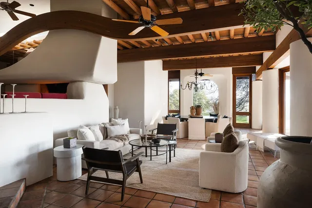 a bed room with a bed and a double vanity