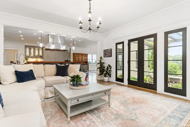 a kitchen with a table and chairs