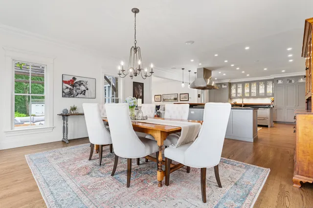 a building outdoor space with patio furniture and potted plants