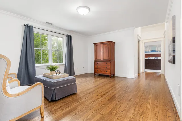 a utility room with cabinets washer and dryer