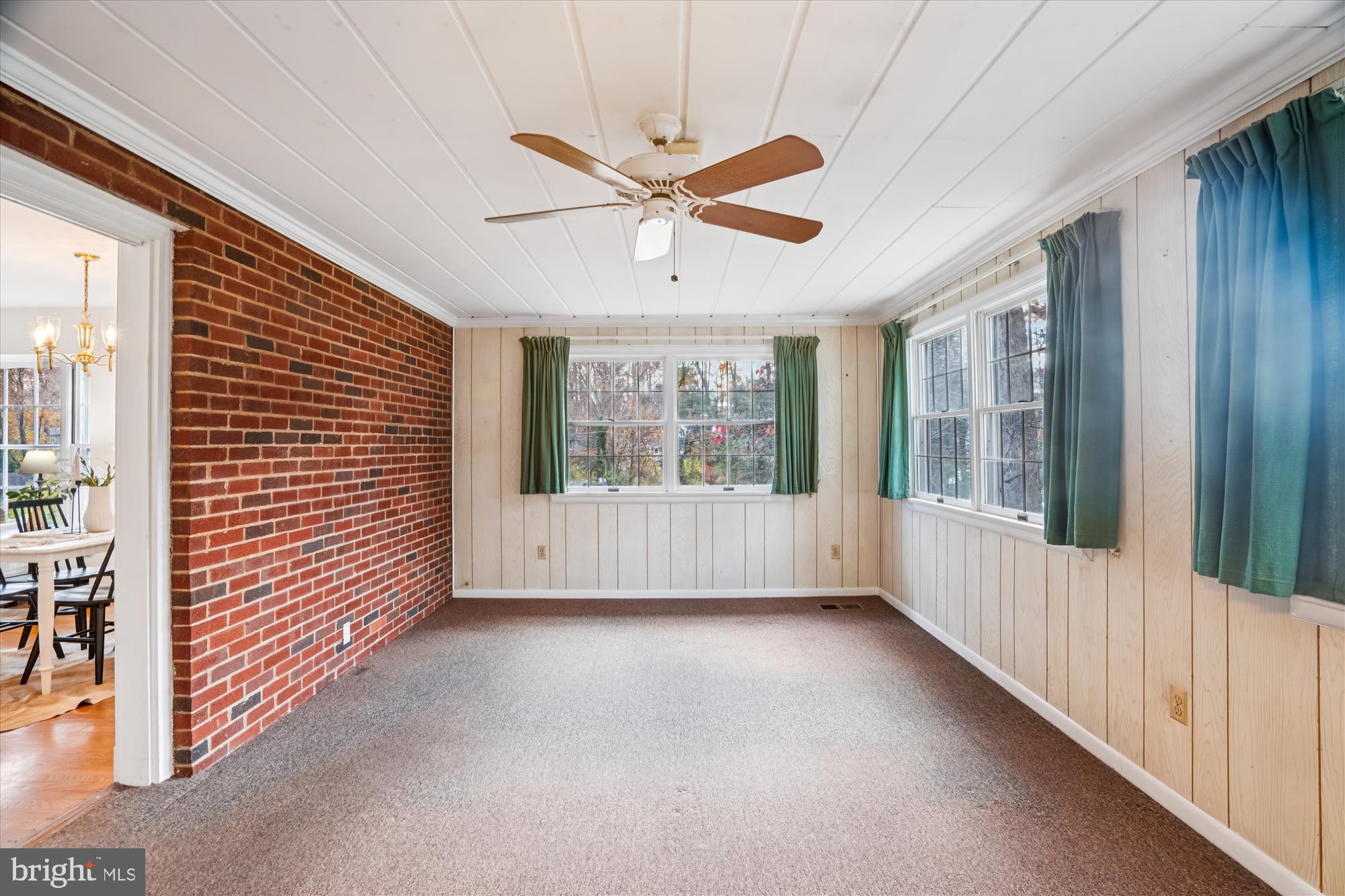 1912 Kimberly Road Silver Spring, MD 20903 - Photo 13 of 45 Sunroom with exposed brick wall