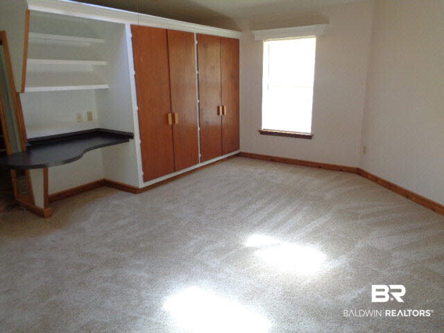 28202 Vargo Lane Elberta, AL 36530 - Photo 16 of 45 Identical bedrooms are 19 x 16. Both have: Numerous closets/built-in cabinets. Built-in desk. Carpet new April 2016.