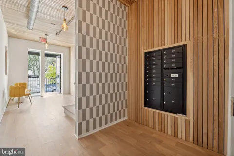 a view of entryway with wooden floor