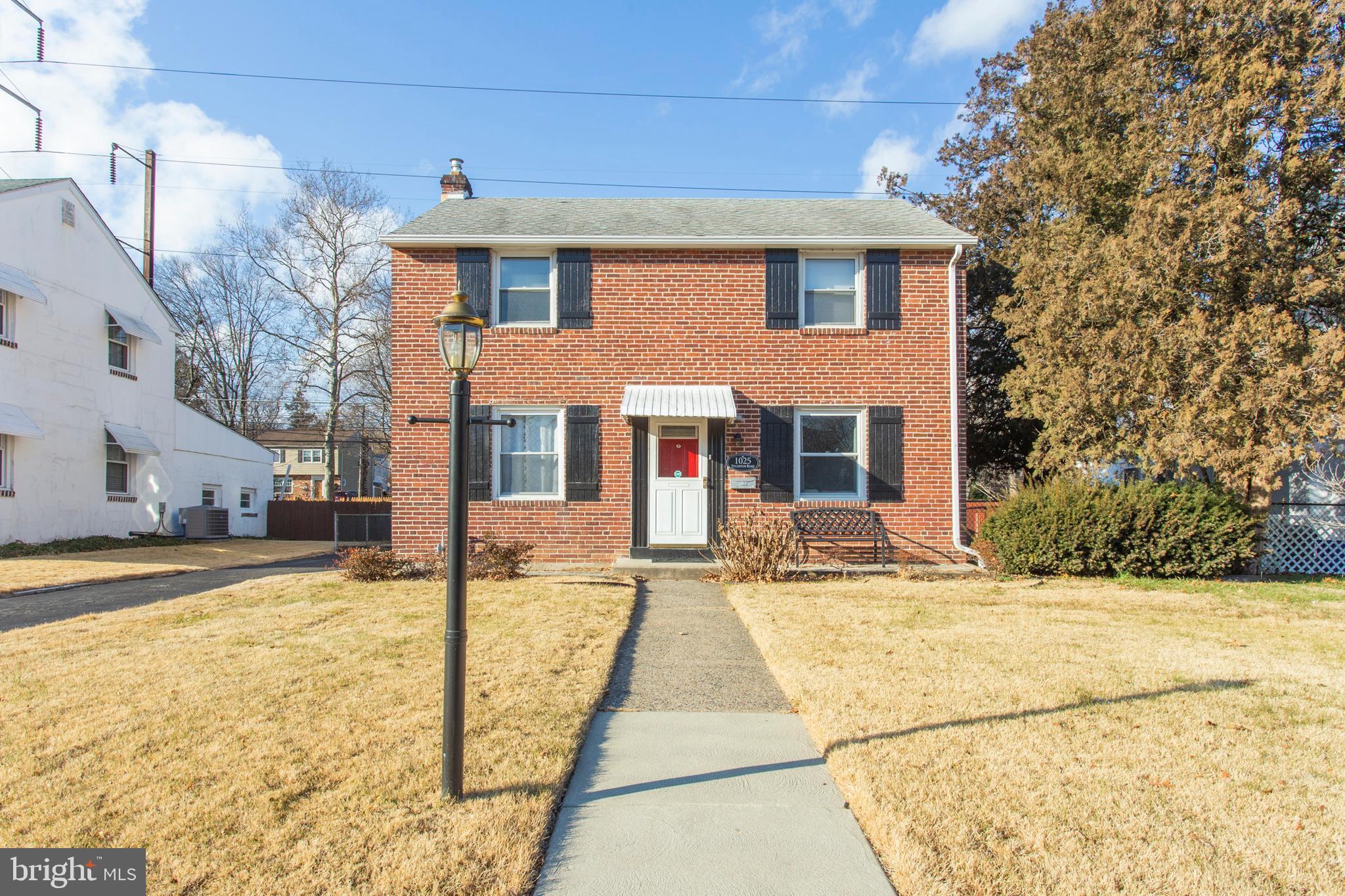 1025 Edgerton Road Secane, PA 19018 - Photo 2 of 21 a view of a brick house with large windows