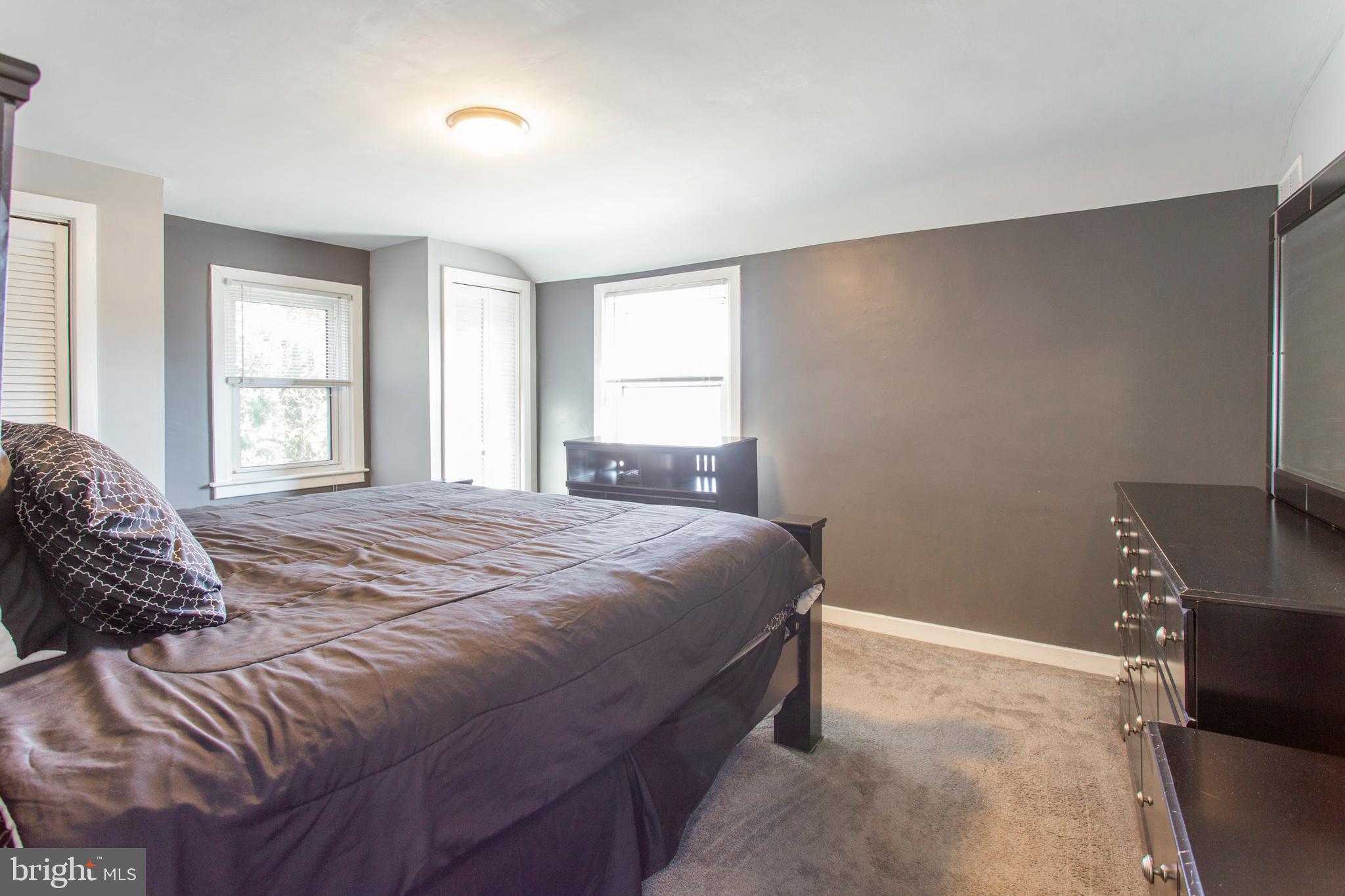 1025 Edgerton Road Secane, PA 19018 - Photo 12 of 21 a bedroom with a bed and a window