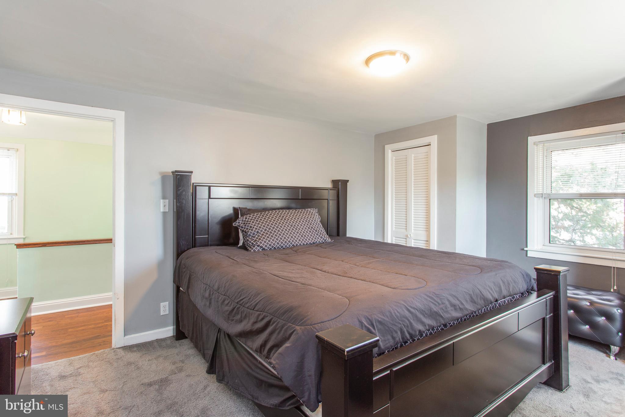 1025 Edgerton Road Secane, PA 19018 - Photo 13 of 21 a bedroom with a bed and window