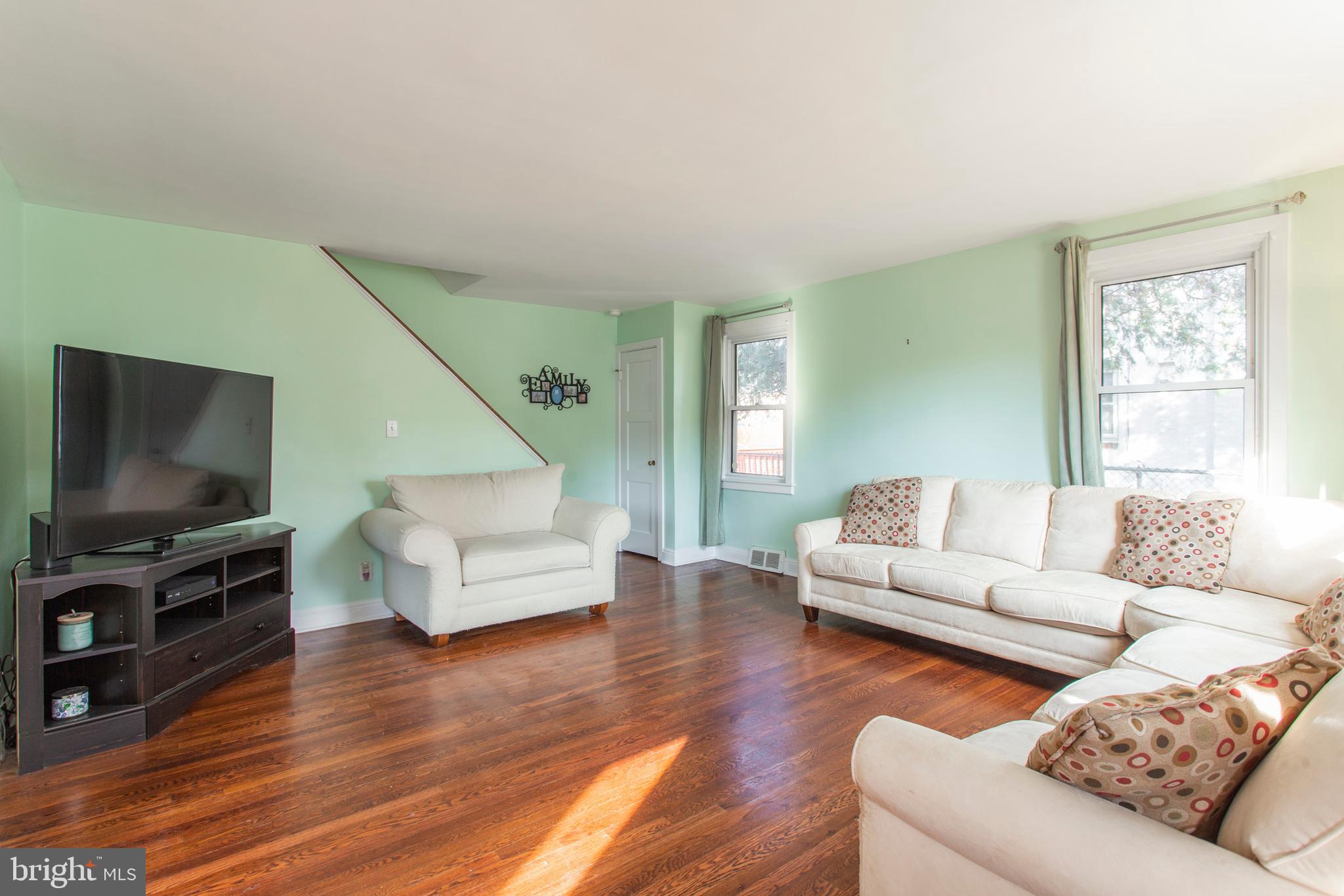 1025 Edgerton Road Secane, PA 19018 - Photo 3 of 21 a living room with furniture and a flat screen tv