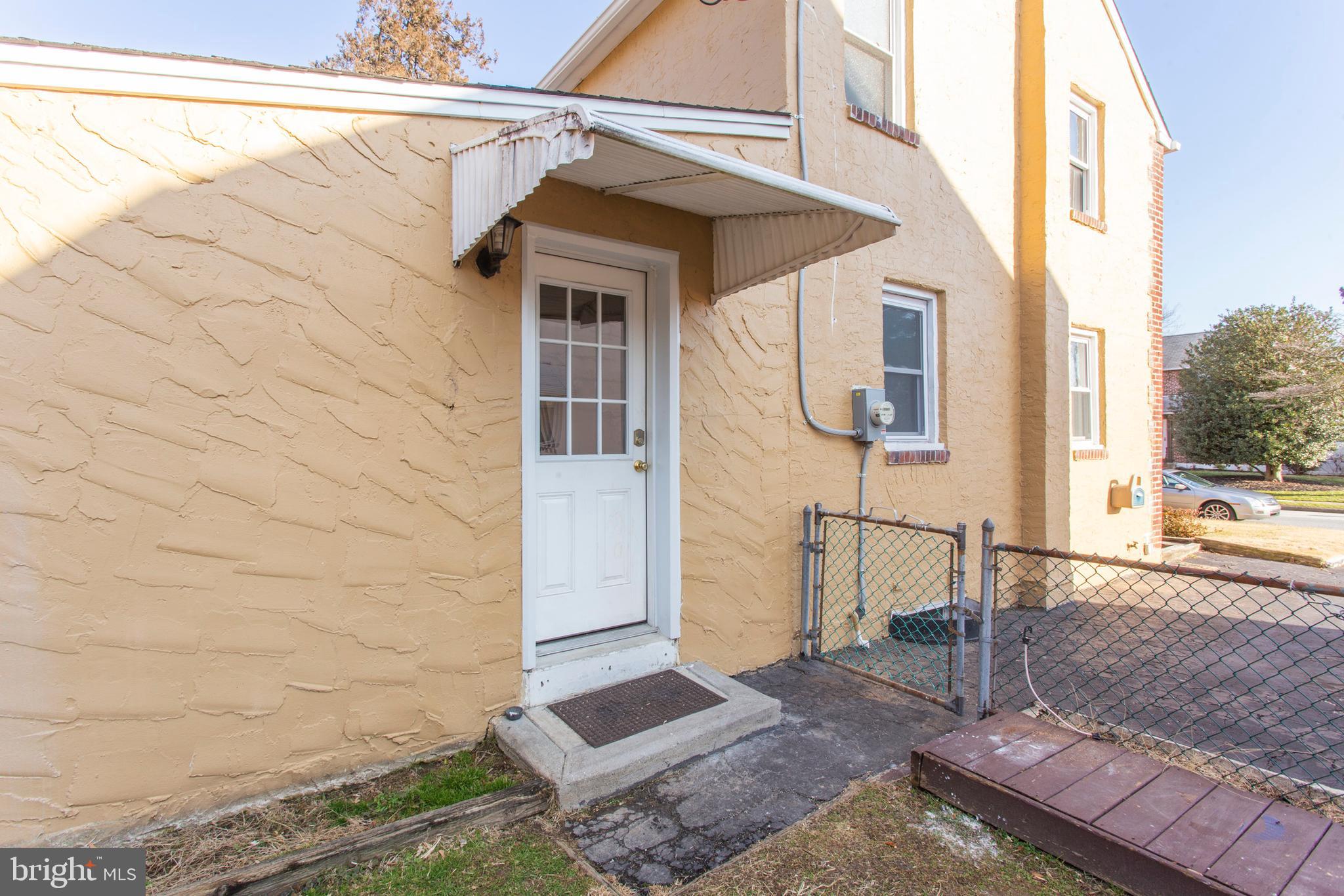 1025 Edgerton Road Secane, PA 19018 - Photo 21 of 21 a view of a wooden door with a yard