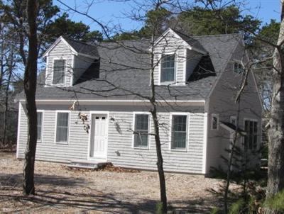 960 Samoset Road Eastham, MA 02642 - Photo 3 of 5 a front view of a house with a yard