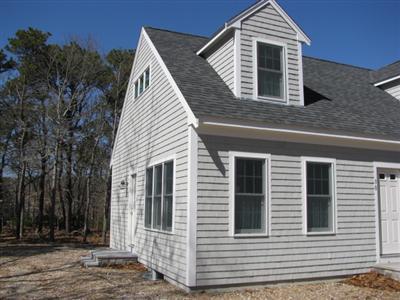 960 Samoset Road Eastham, MA 02642 - Photo 5 of 5 a view of a house with a door
