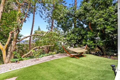 a view of a small yard and sitting area