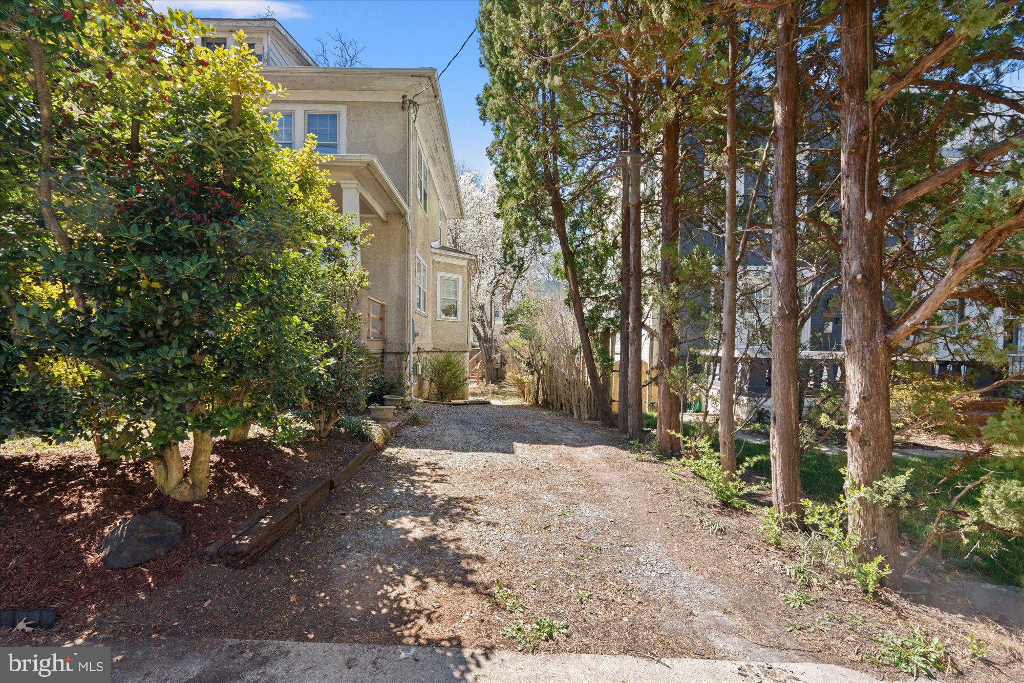4304 River Road Northwest Washington, DC 20016 - Photo 2 of 33 Off-Street parking to the side of the house