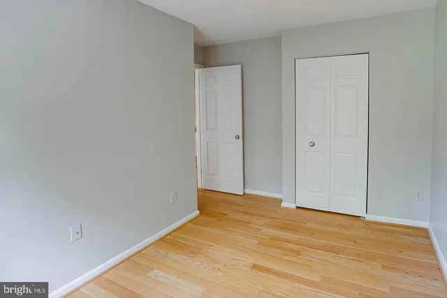a bathroom with a sink vanity and a mirror