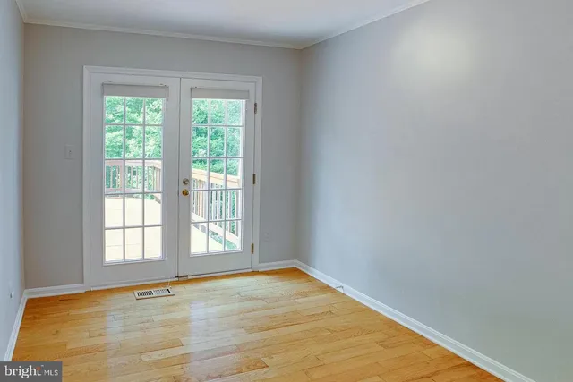 a view of an empty room and window