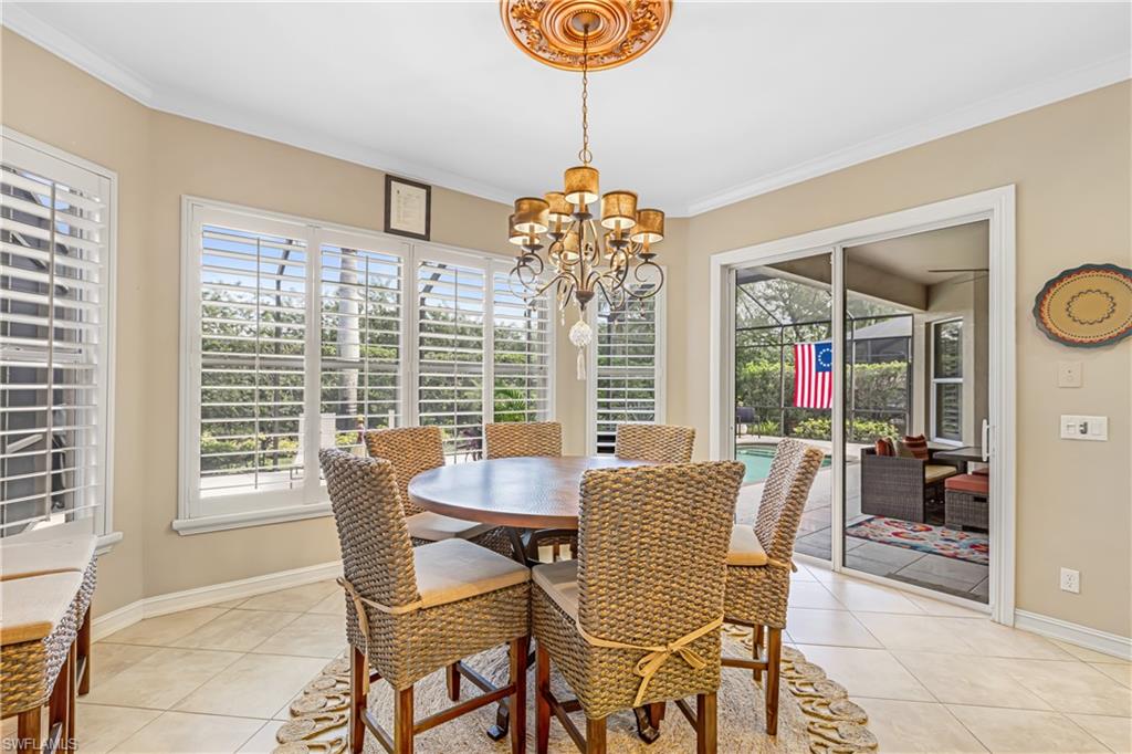 12567 Grandezza Circle Estero, FL 33928 - Photo 12 of 47 a dining room with furniture and window