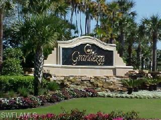 12567 Grandezza Circle Estero, FL 33928 - Photo 26 of 47 a view of outdoor space with garden
