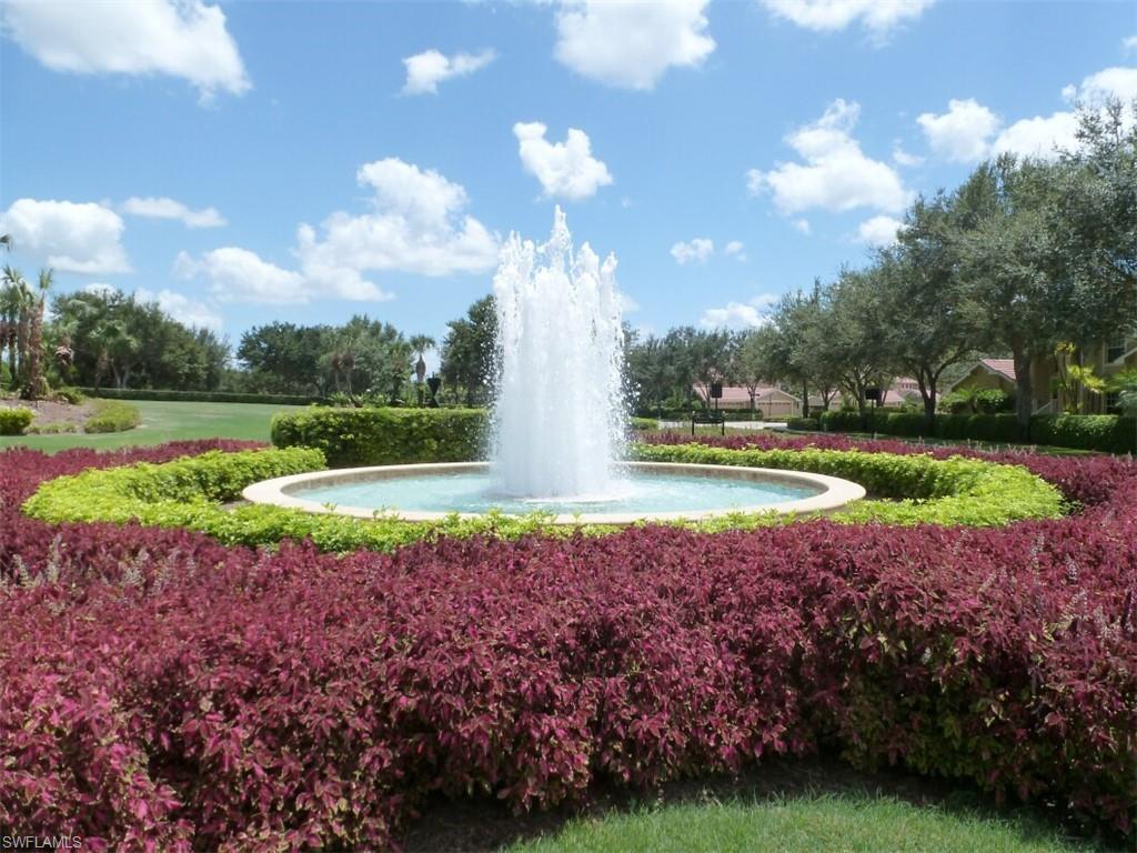 12567 Grandezza Circle Estero, FL 33928 - Photo 28 of 47 a view of a golf course with a house