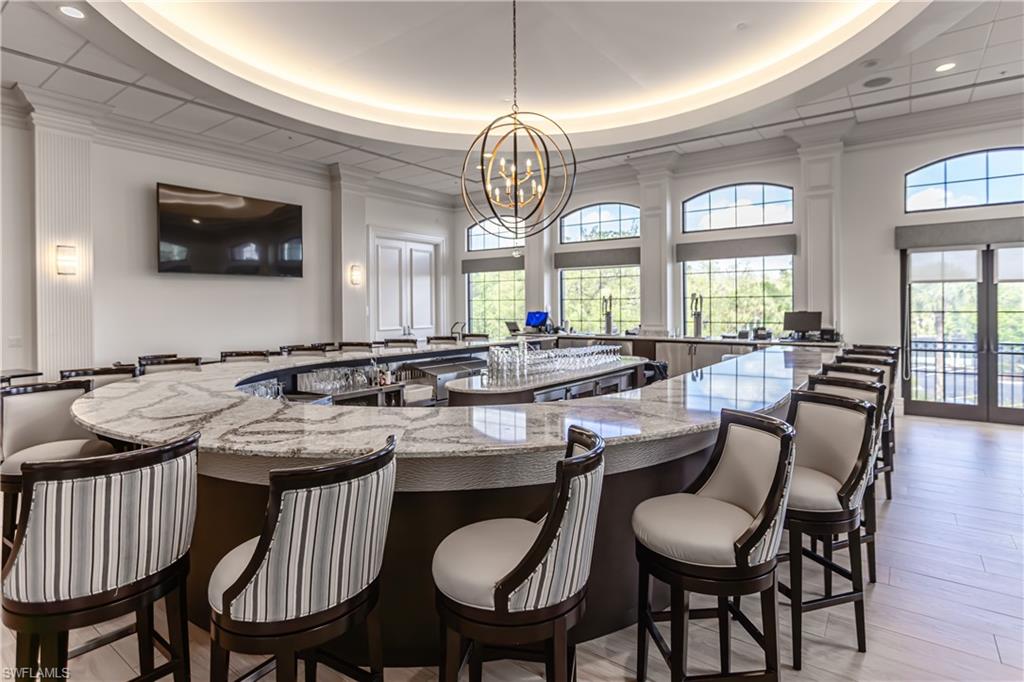 12567 Grandezza Circle Estero, FL 33928 - Photo 33 of 47 a view of a dining room with furniture and window