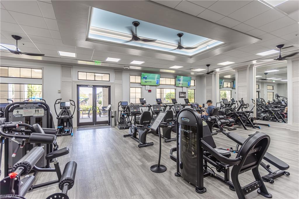 12567 Grandezza Circle Estero, FL 33928 - Photo 37 of 47 a very nice looking room with gym equipment