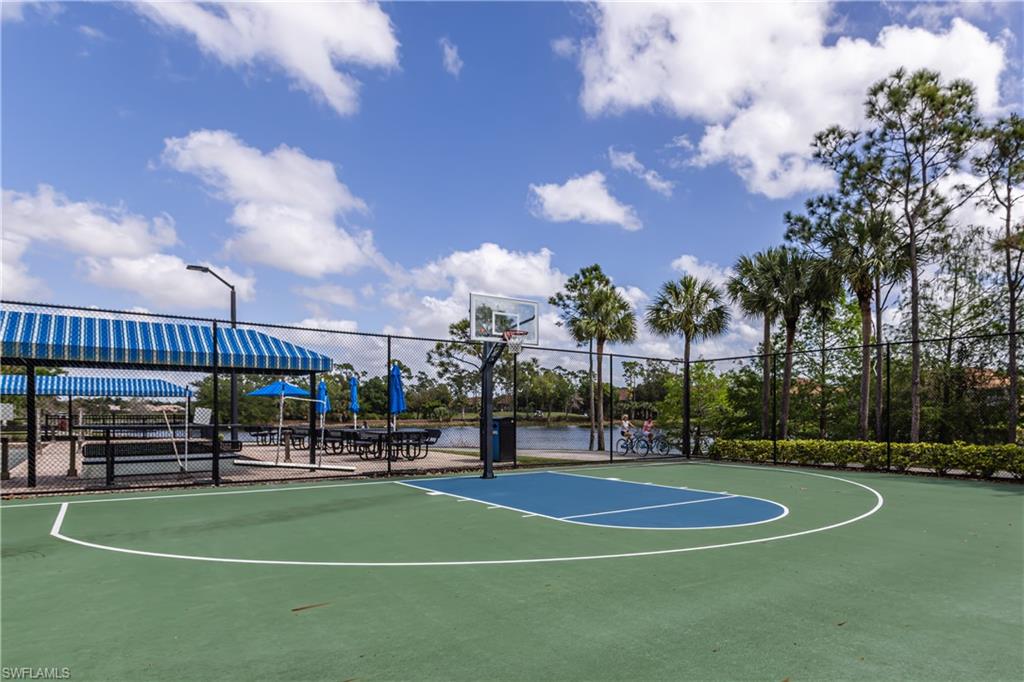 12567 Grandezza Circle Estero, FL 33928 - Photo 38 of 47 a view of a playground with basketball court
