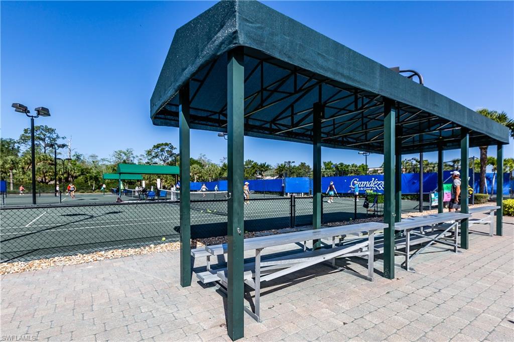 12567 Grandezza Circle Estero, FL 33928 - Photo 39 of 47 a view of under a patio with a table and chairs