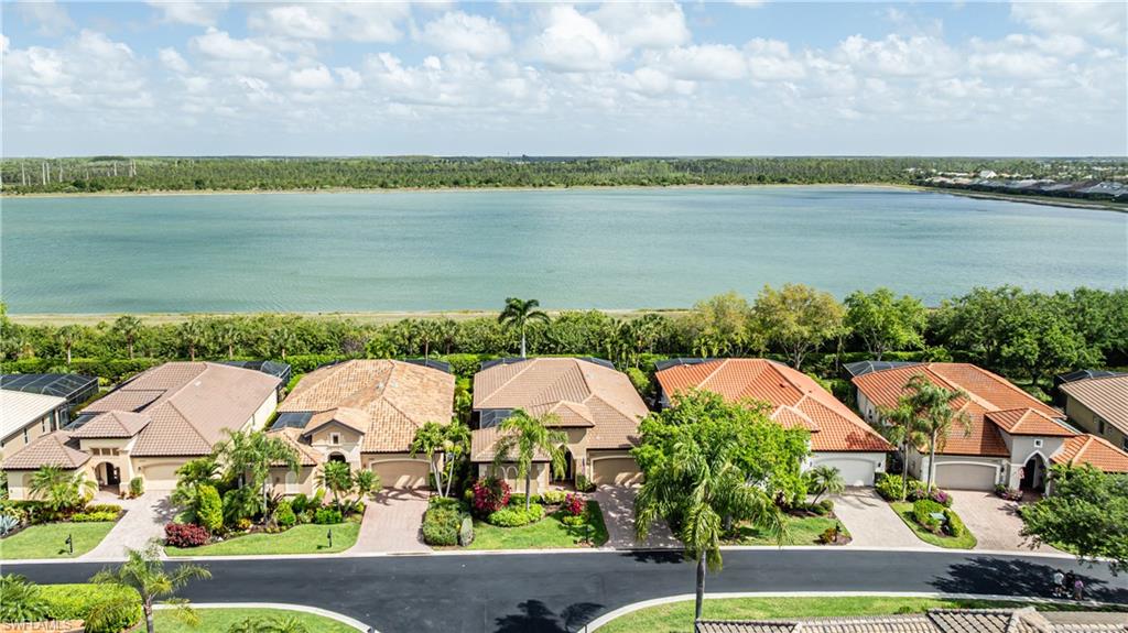 12567 Grandezza Circle Estero, FL 33928 - Photo 4 of 47 an aerial view of multiple house