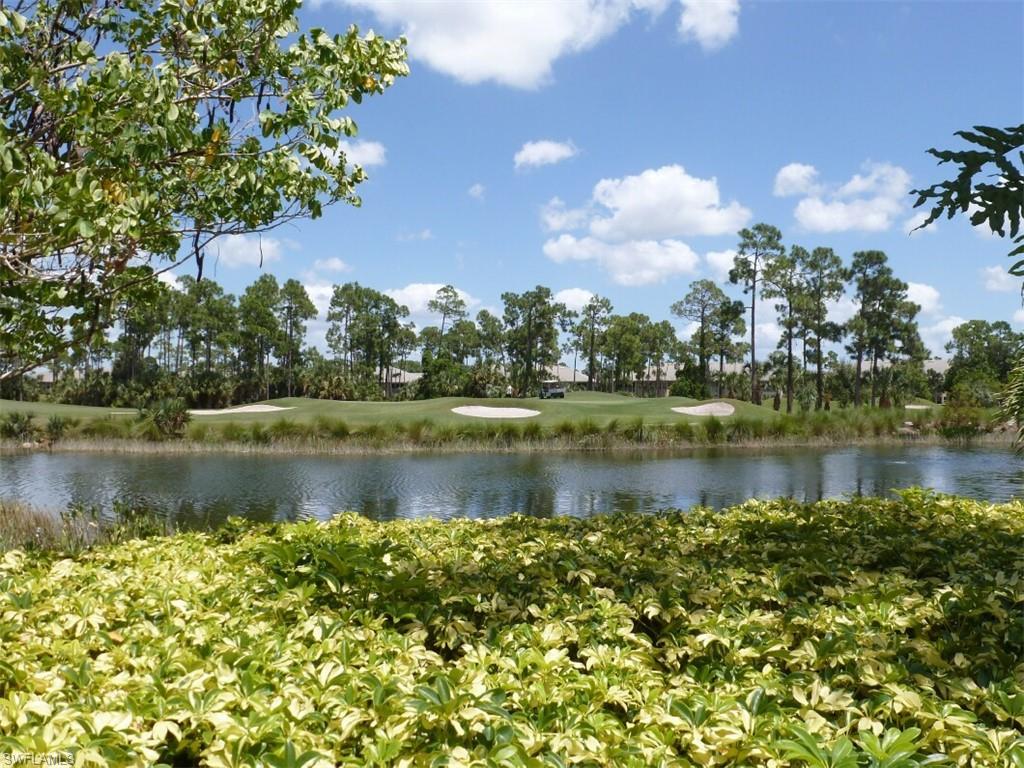 12567 Grandezza Circle Estero, FL 33928 - Photo 41 of 47 a view of a lake with a city