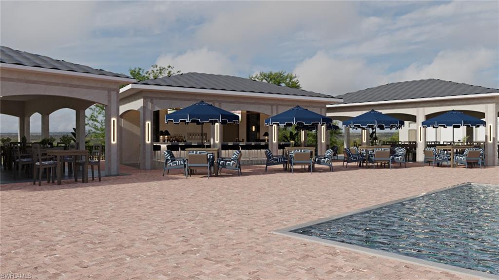 12567 Grandezza Circle Estero, FL 33928 - Photo 45 of 47 a view of a chairs and tables in patio