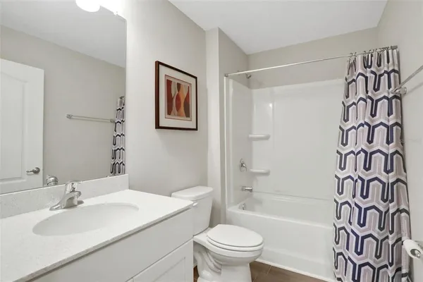 a work room with furniture and wooden floor