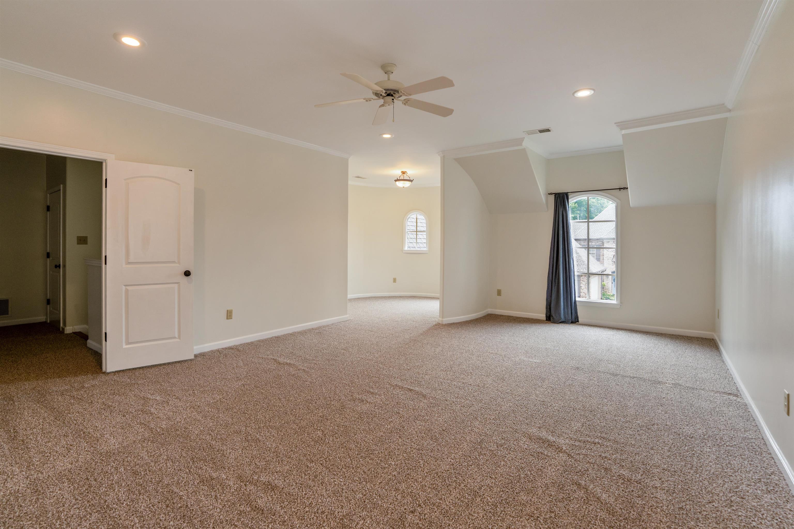 3485 East Taplow Way Collierville, TN 38017 - Photo 16 of 38 a view of an empty room with a window