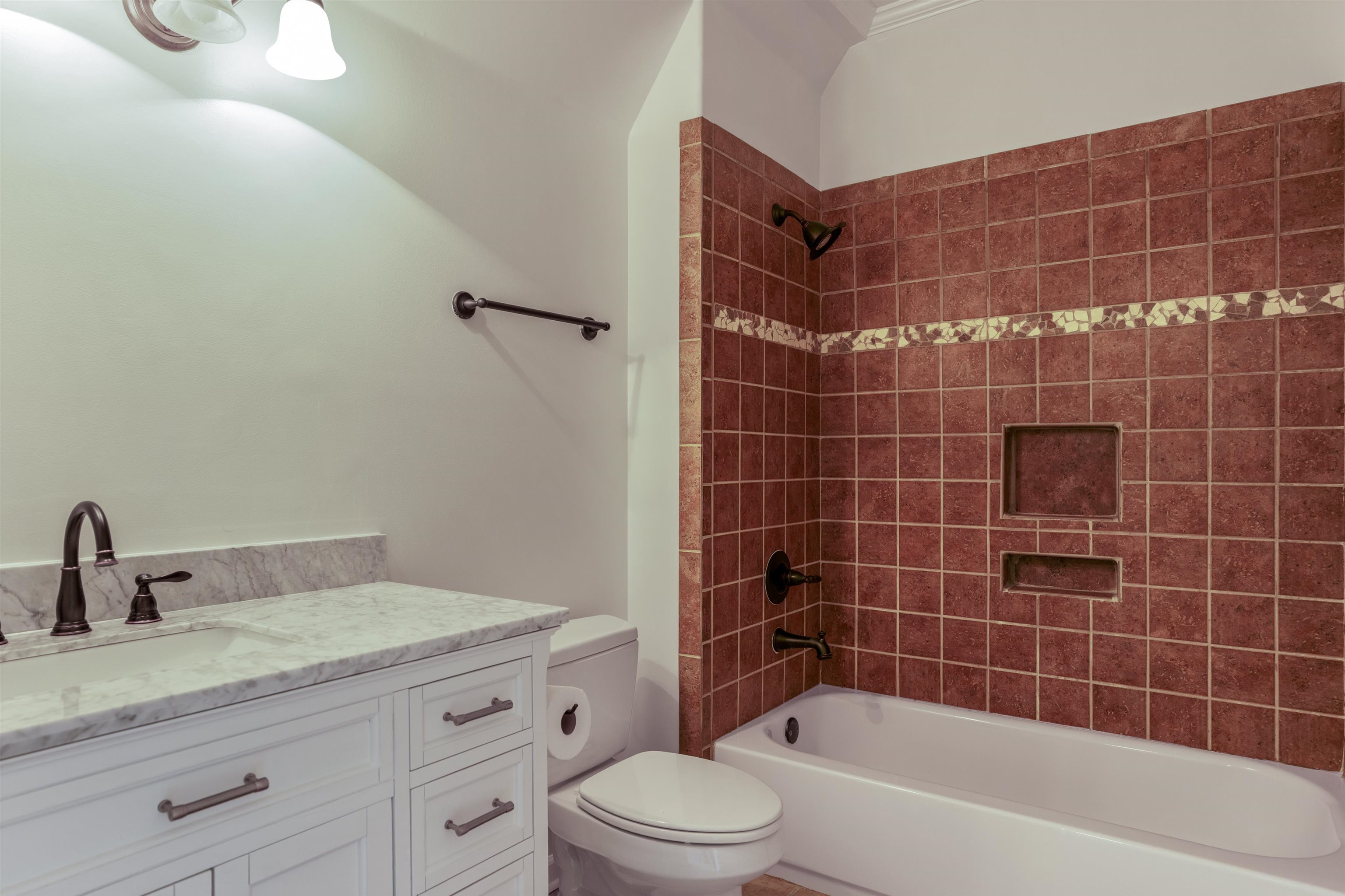 3485 East Taplow Way Collierville, TN 38017 - Photo 24 of 38 a bathroom with a granite countertop sink a toilet and bathtub