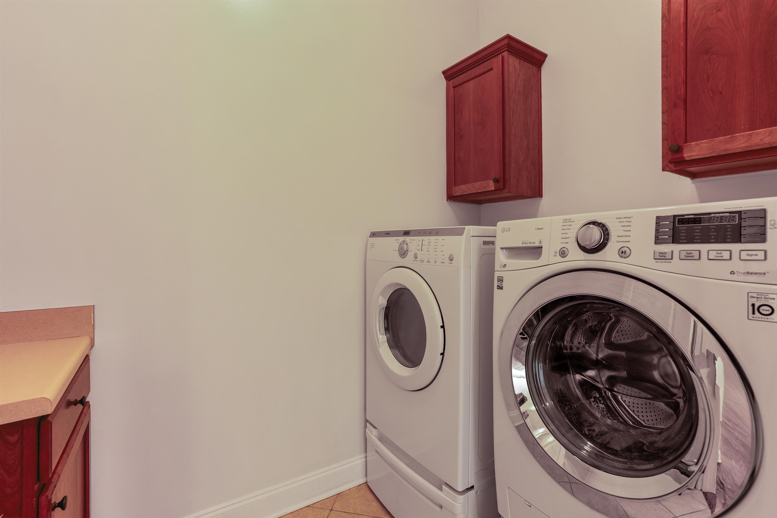 3485 East Taplow Way Collierville, TN 38017 - Photo 25 of 38 a utility room with dryer and washer