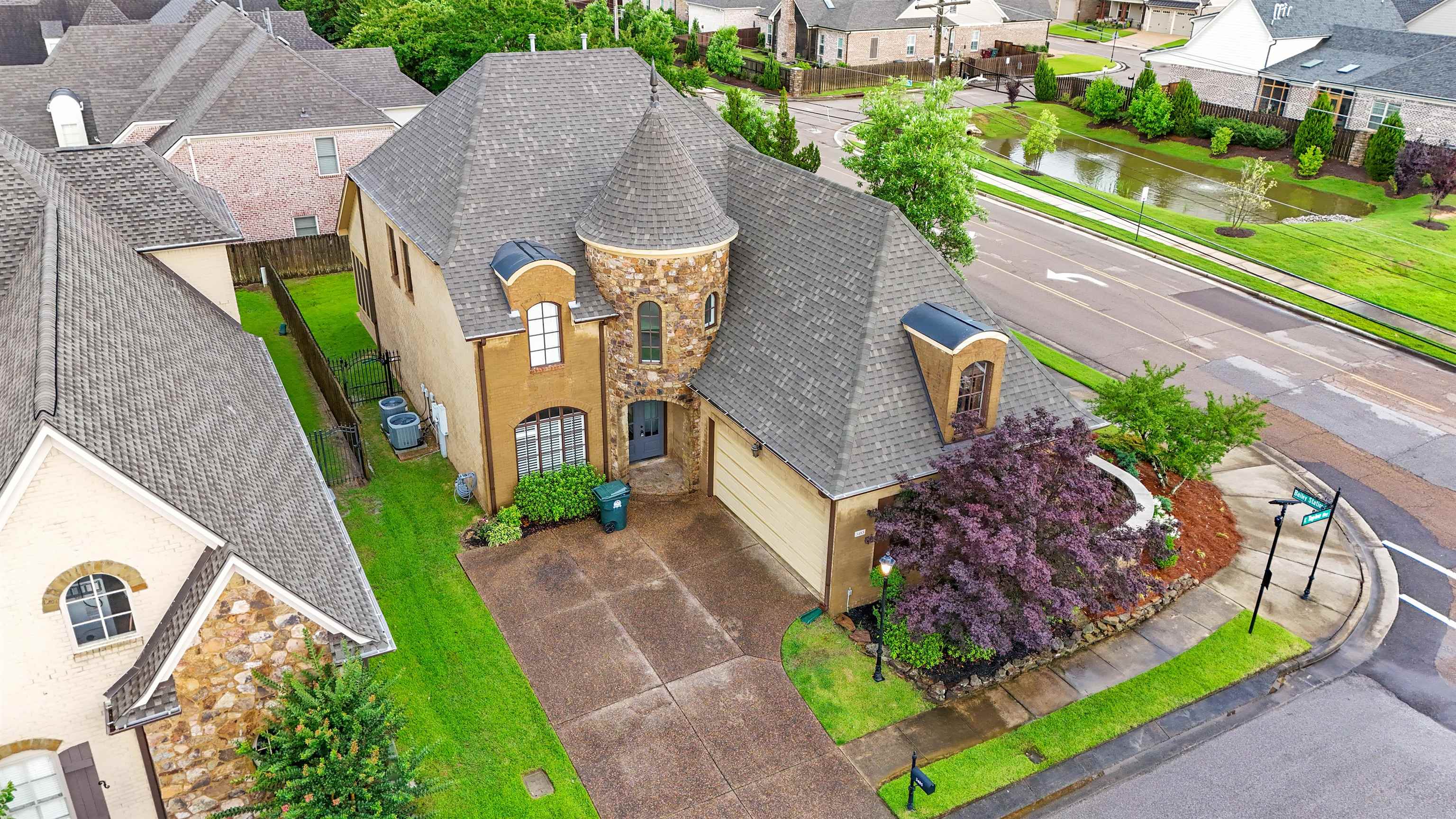 3485 East Taplow Way Collierville, TN 38017 - Photo 30 of 38 aerial view of a house with a yard and potted plants
