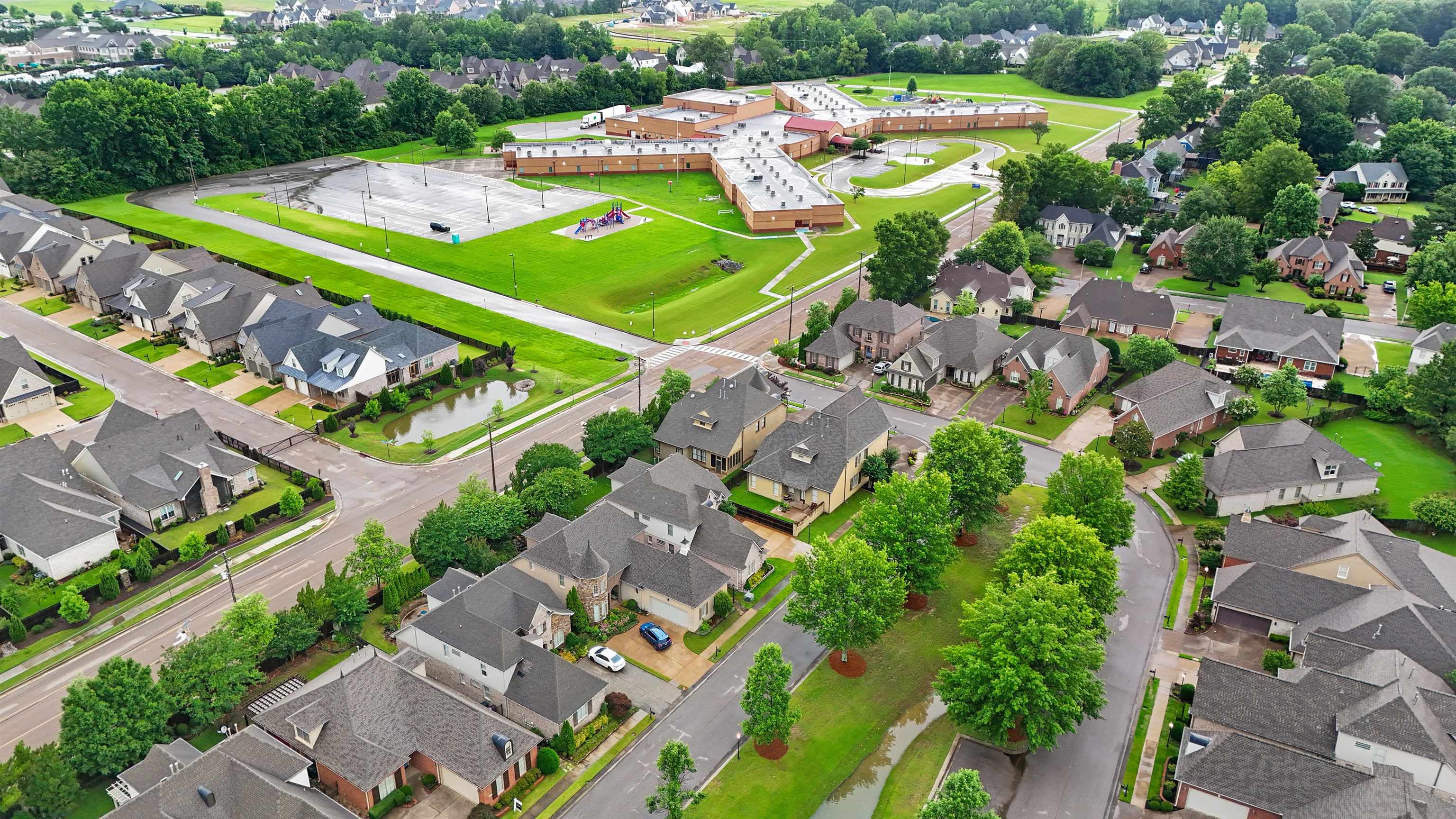 3485 East Taplow Way Collierville, TN 38017 - Photo 36 of 38 an aerial view of a pool yard and mountain view in back