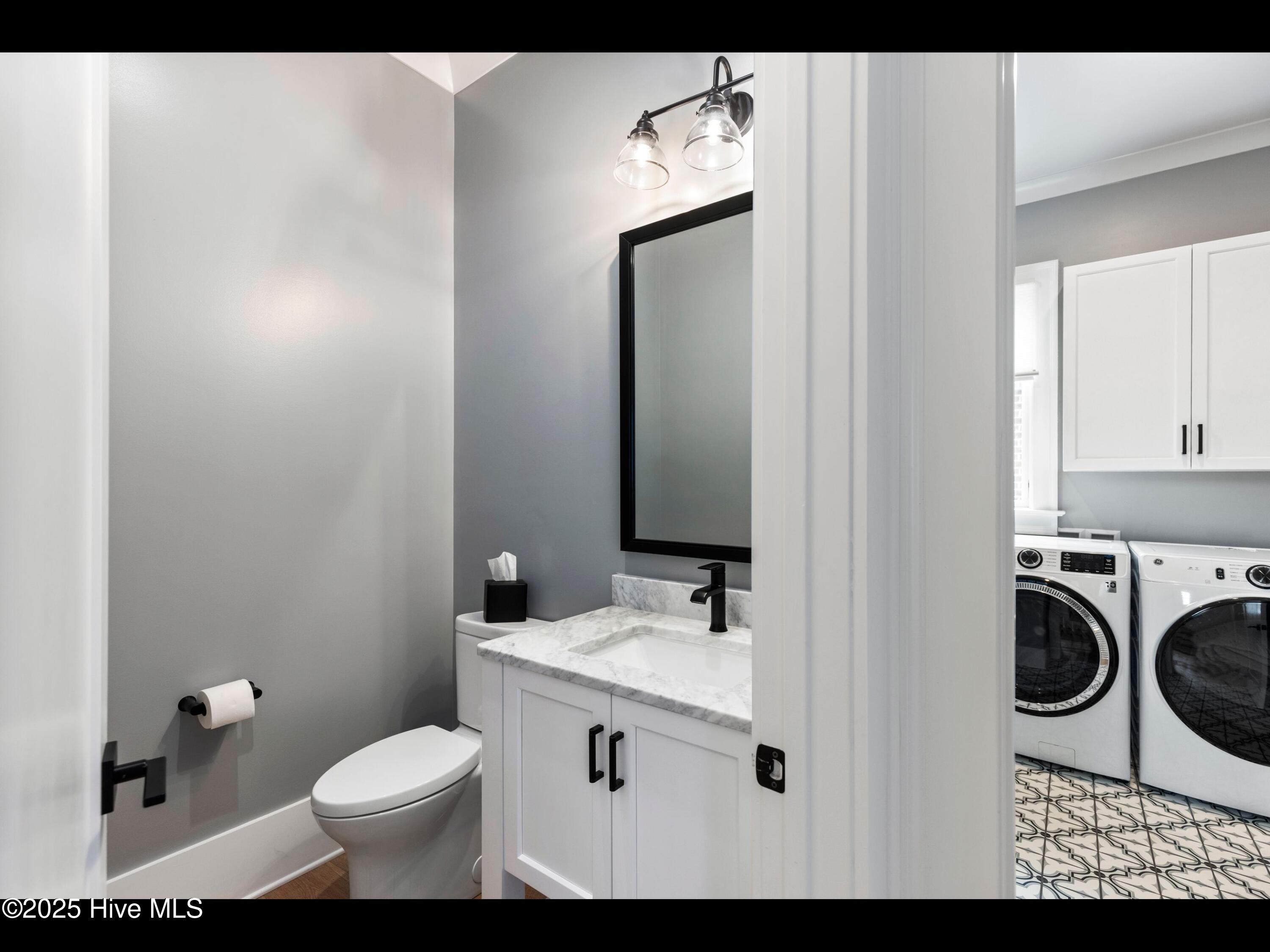 1012 Midnight Channel Road Wilmington, NC 28403 - Photo 43 of 105 Primary Level Half Bathroom