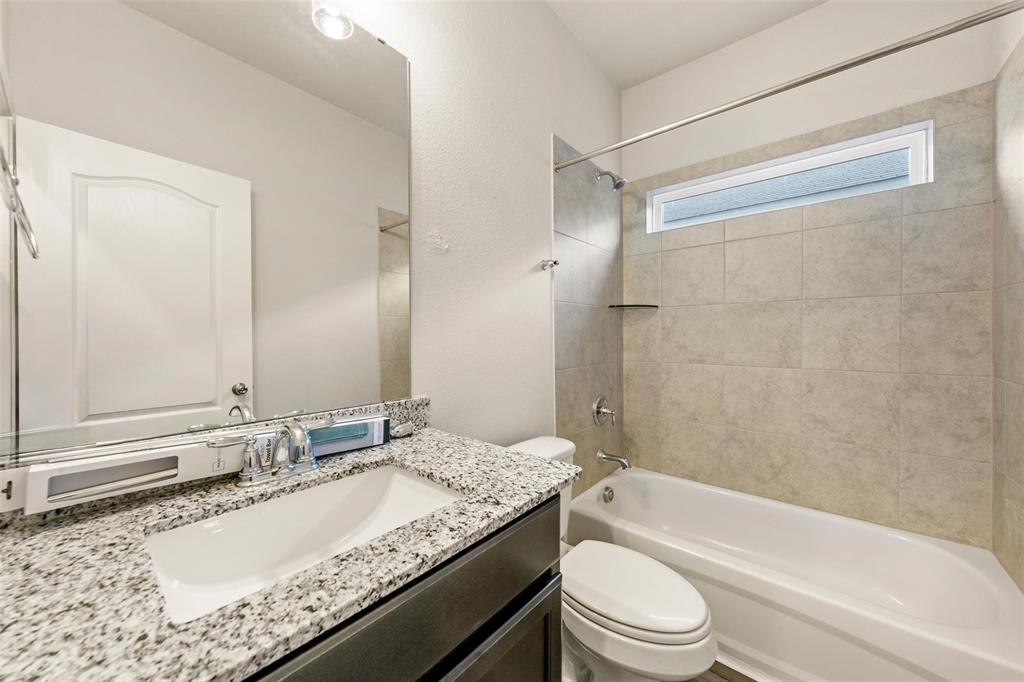 11304 Solar Street Lorena, TX 76655 - Photo 22 of 34 Full bathroom with vanity and shower / tub combination