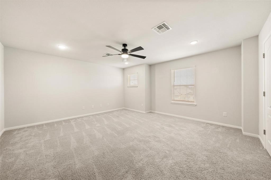11304 Solar Street Lorena, TX 76655 - Photo 24 of 34 Unfurnished room with light carpet, recessed lighting, and ceiling fan